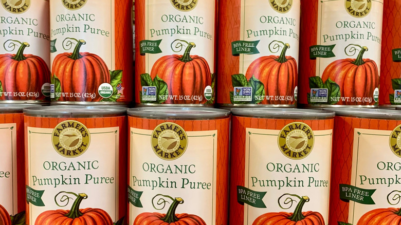 Stacked cans of organic pumpkin puree