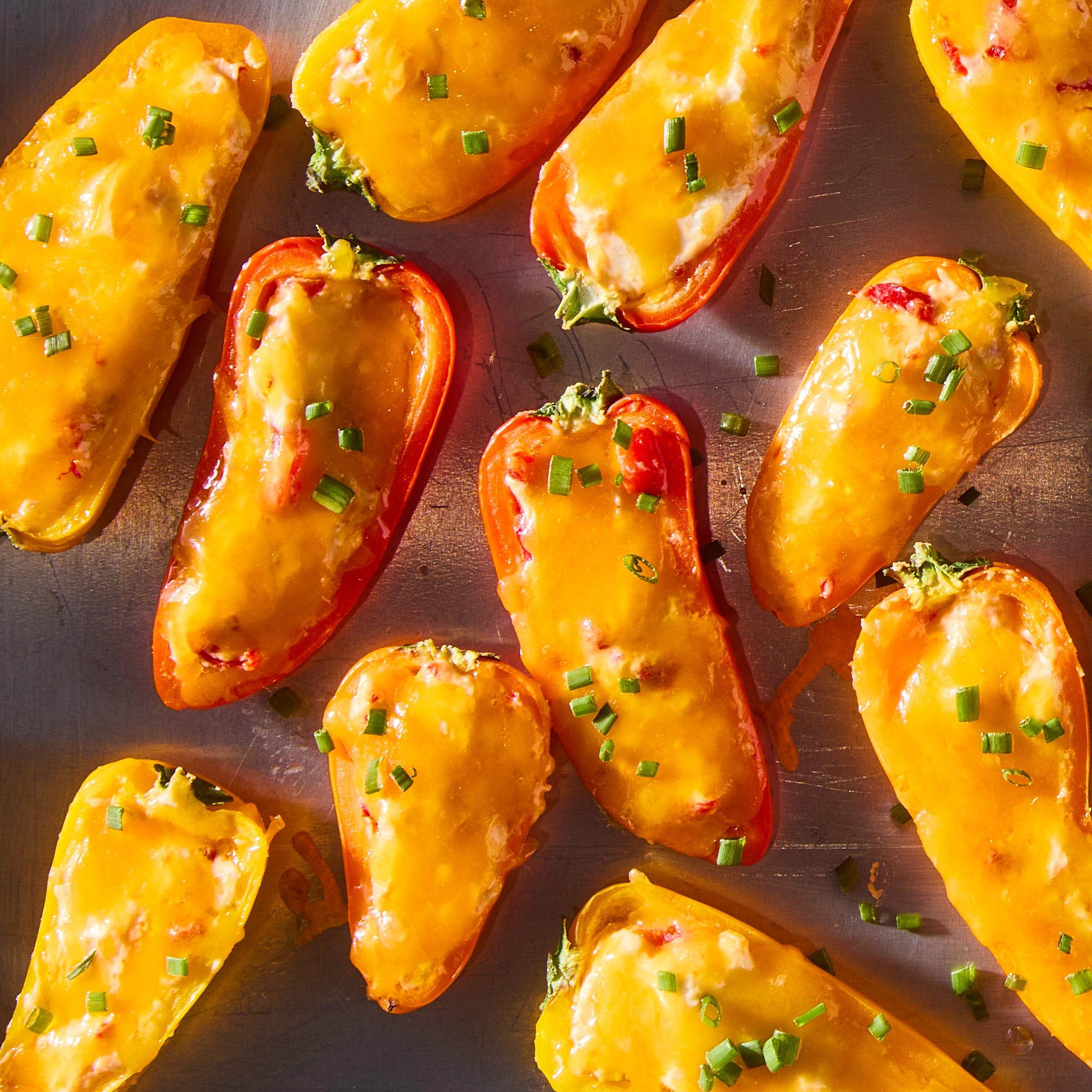 mini red and yellow peppers stuffed with pimento cheese and baked