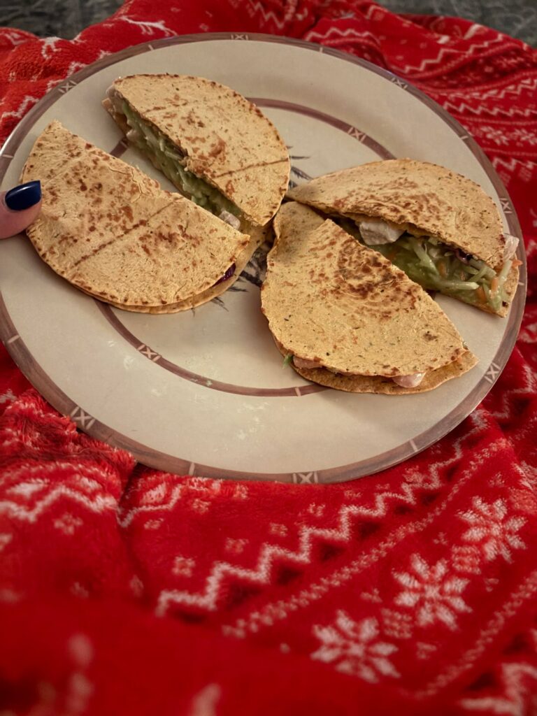 My favorite, extremely filling, 350 calorie snack. Chicken salad on toasted zero tortillas