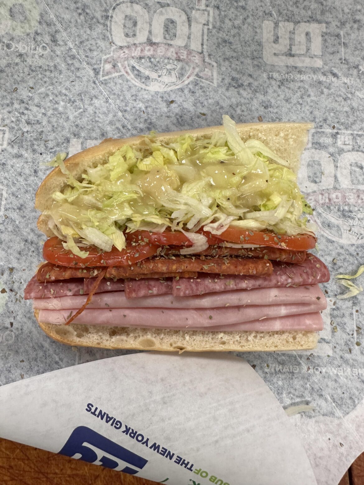 An Italian I made at work. I make sandwiches all day and I thought this one came out decent looking