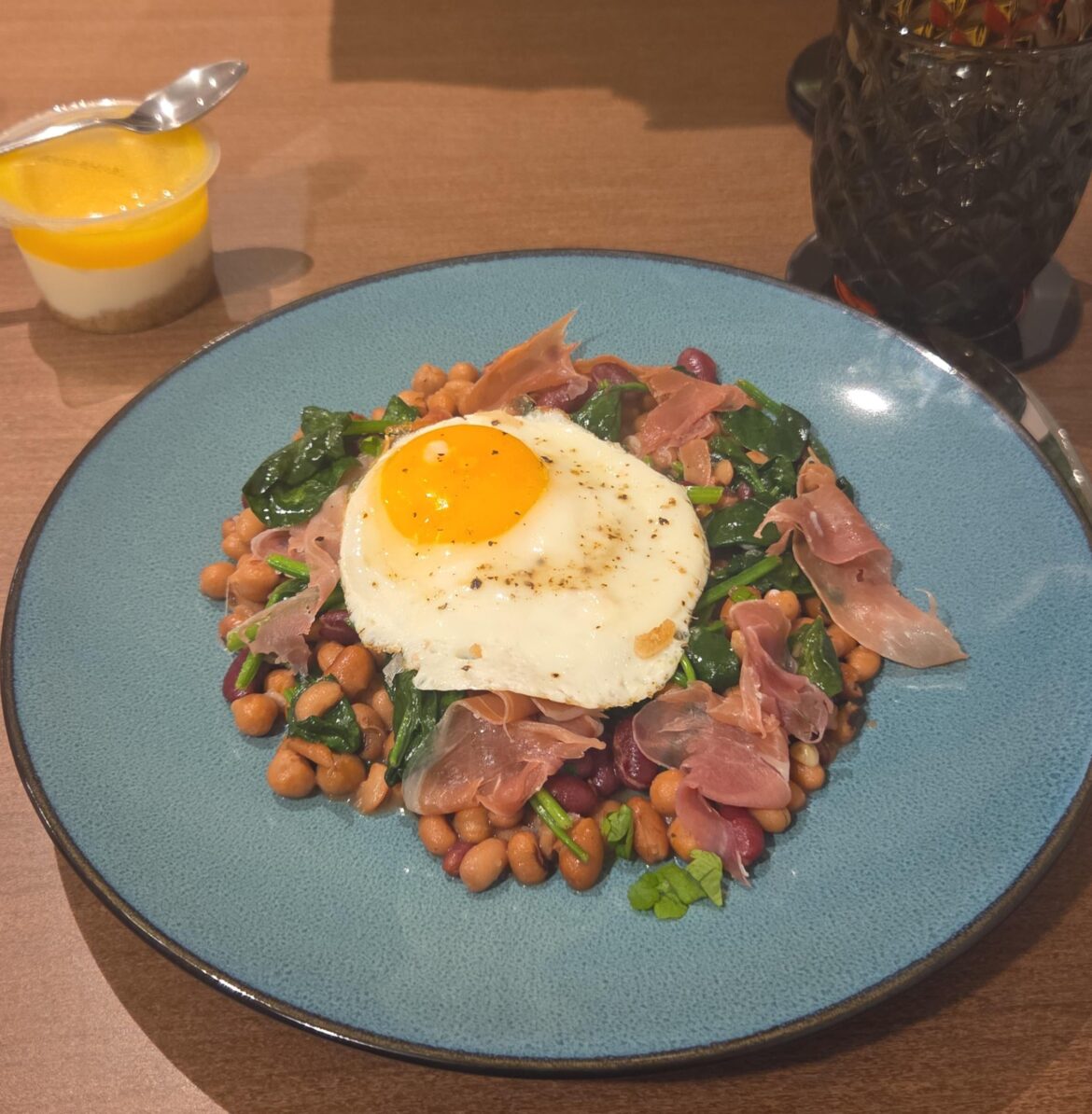 Mixed beans cooked with butter, lemon and spinach with some Parmaham and an egg
