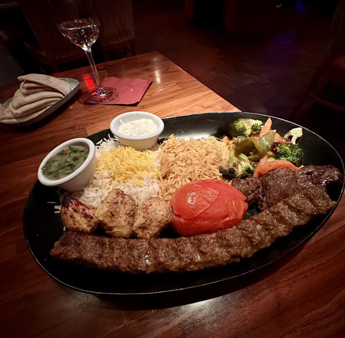 Mediterranean Dish with Lamb, Chicken and Beef Kabobs, served with Rice and Vegetable Medley