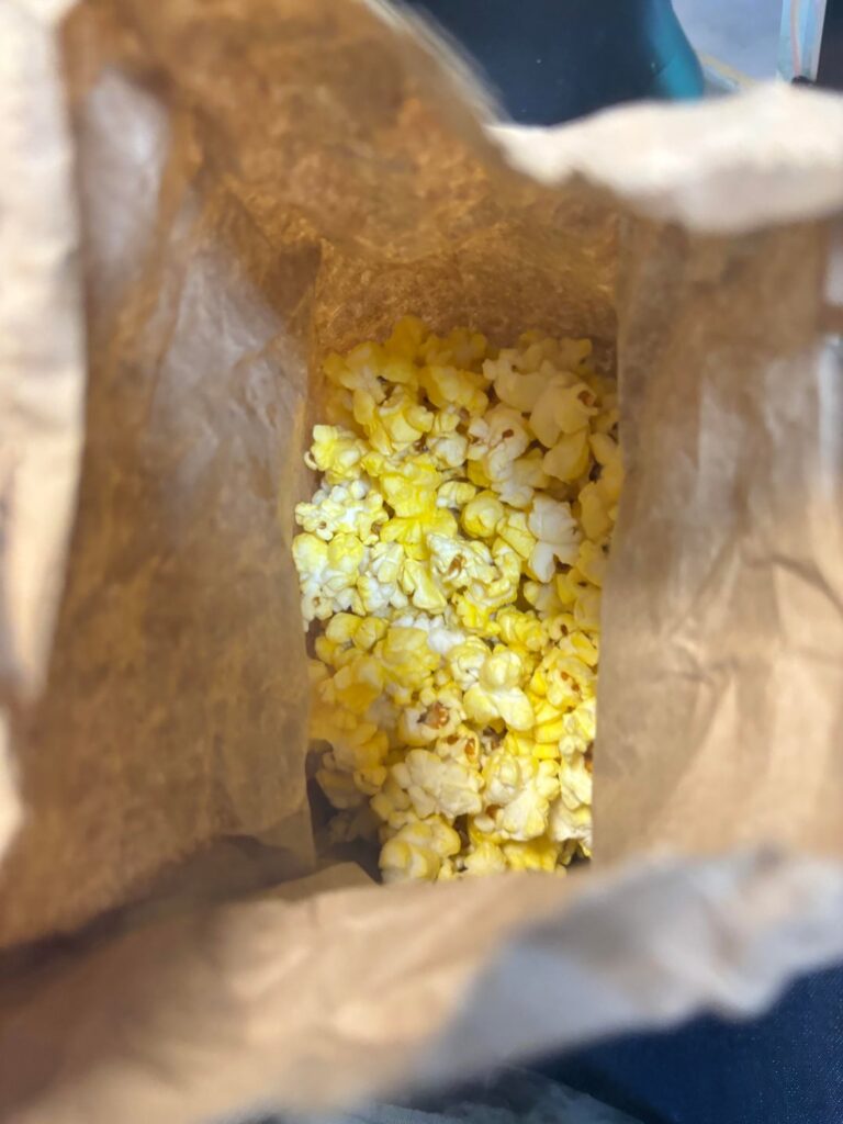 How much for half a bag of theme park butter popcorn?