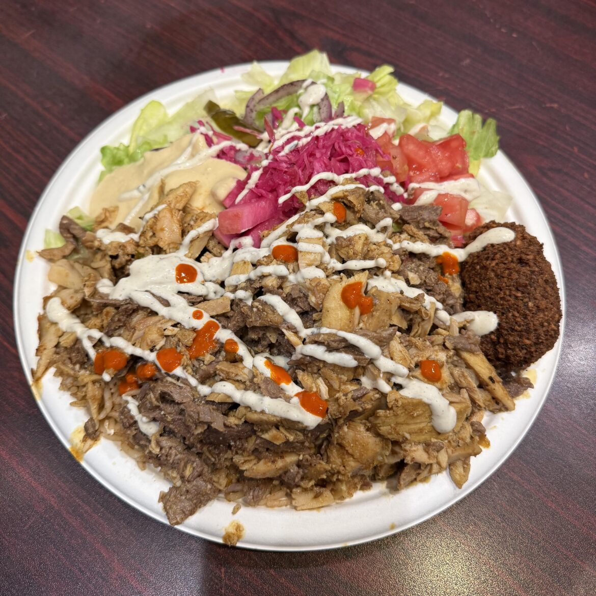 Mixed shawarma platter from King of Falafel & Shawarma. They oftentimes give a free falafel while you wait. (Astoria, Queens) Mixed shawarma platter from King of Falafel & Shawarma. They oftentimes give a free falafel while you wait. (Astoria, Queens)
