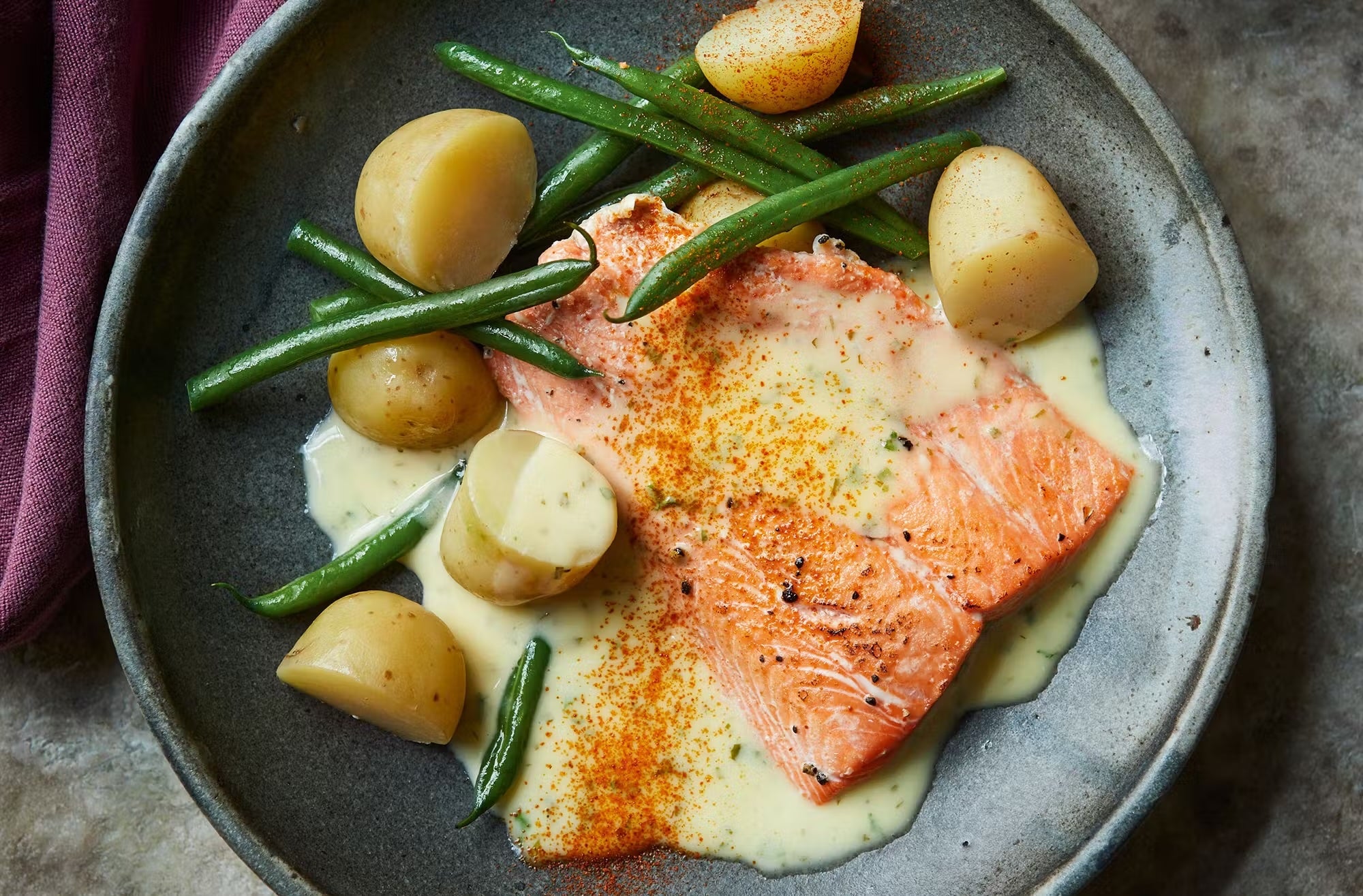 A classic Norwegian pairing that shows the indulgent side of “healthy”: rich butter sauce meets lean, wild salmon