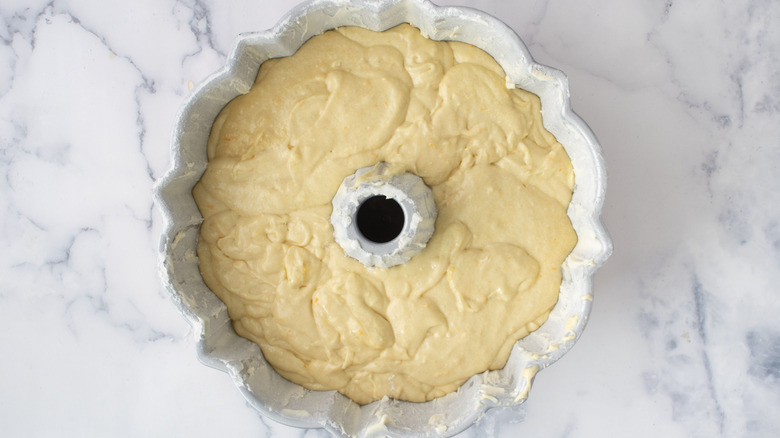 Unbaked cake batter in Bundt pan