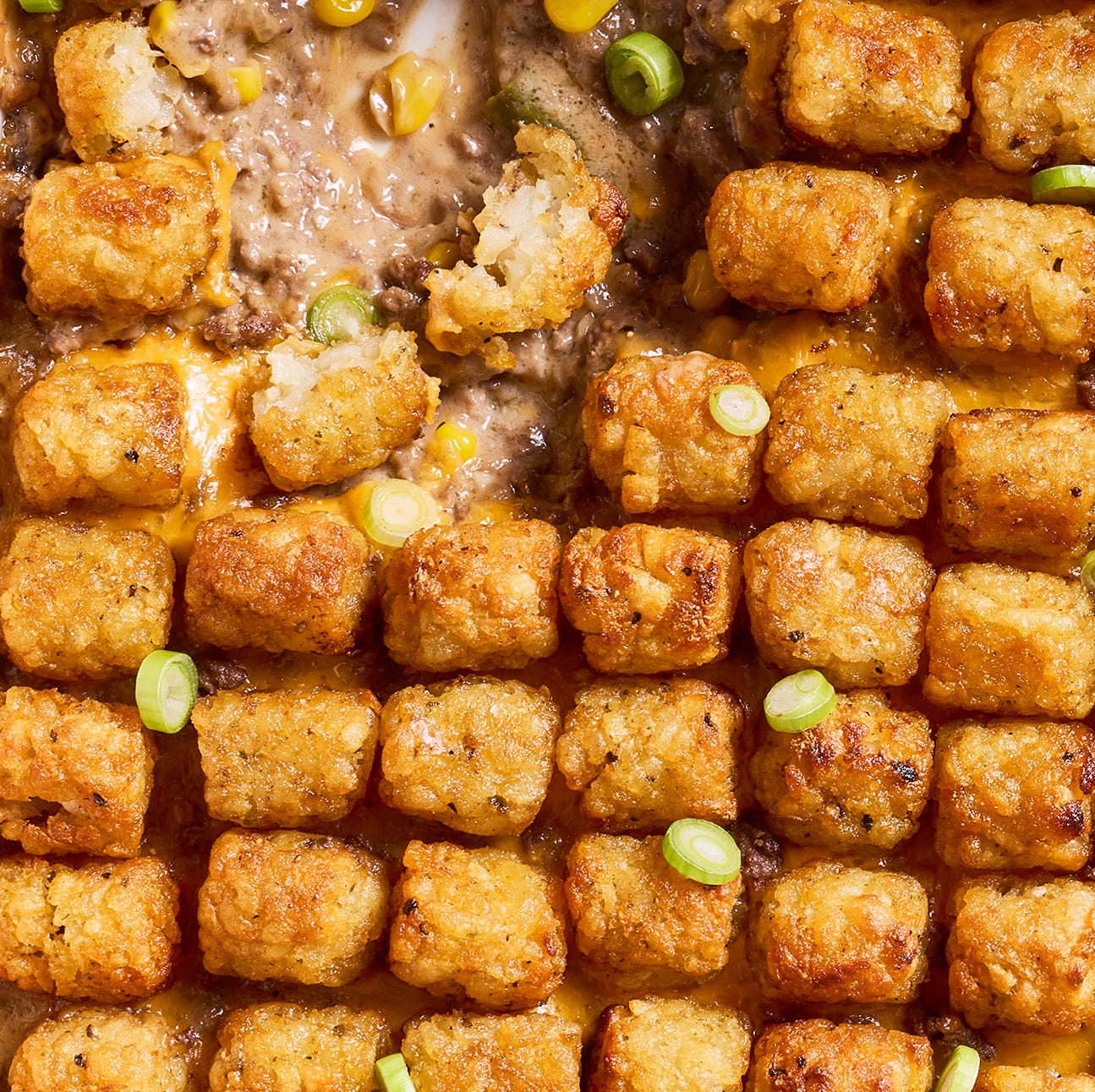 tater tot casserole with ground beef, corn, and cheddar cheese