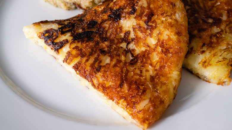 Italian Montasio Cheese and Potato Rosti with Polenta a Traditional Dish from the Friaul Region of Italy