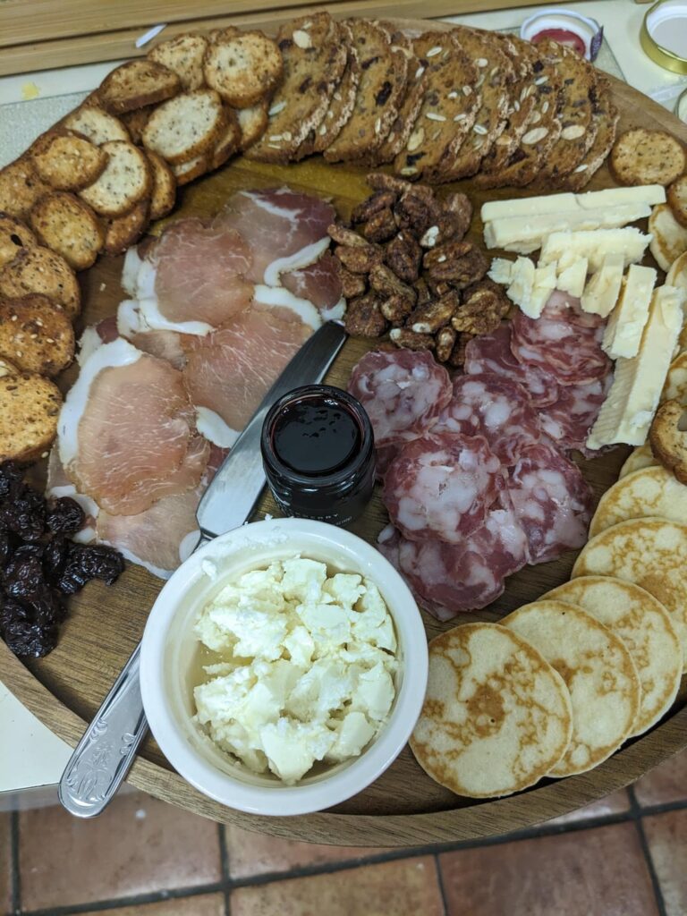 Simplistic little charcuterie board with the Appy hour subscription box