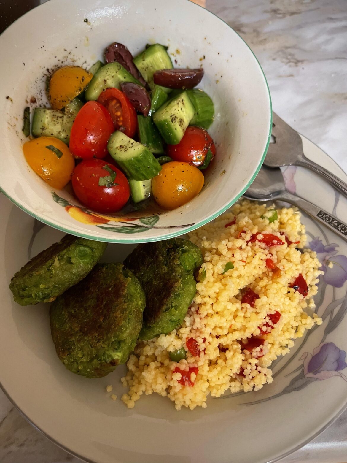Green pea falafel, couscous, and Greek salad