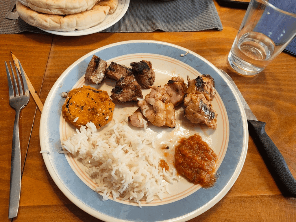 How much for this? 1st pic: grilled beef & chicken skewers, some rice, and fried eggplant 2nd pic: chicken soup with onion