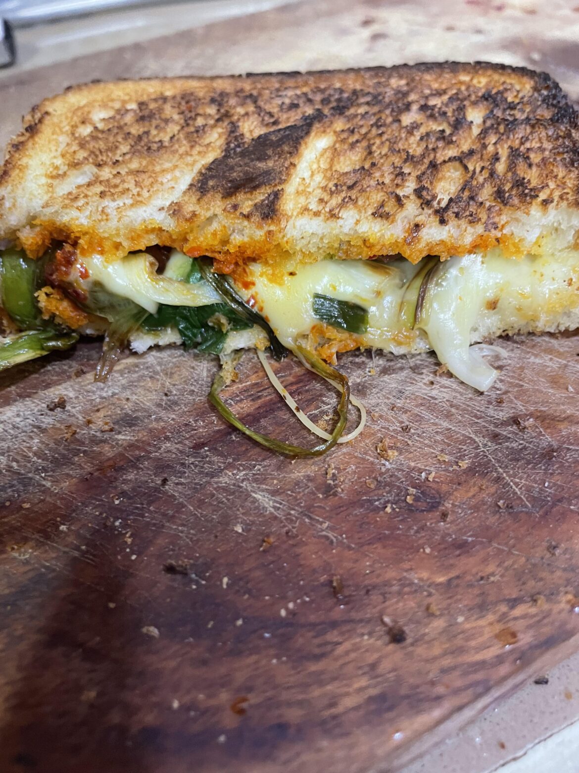 spring onions and green garlic in my cheese melt