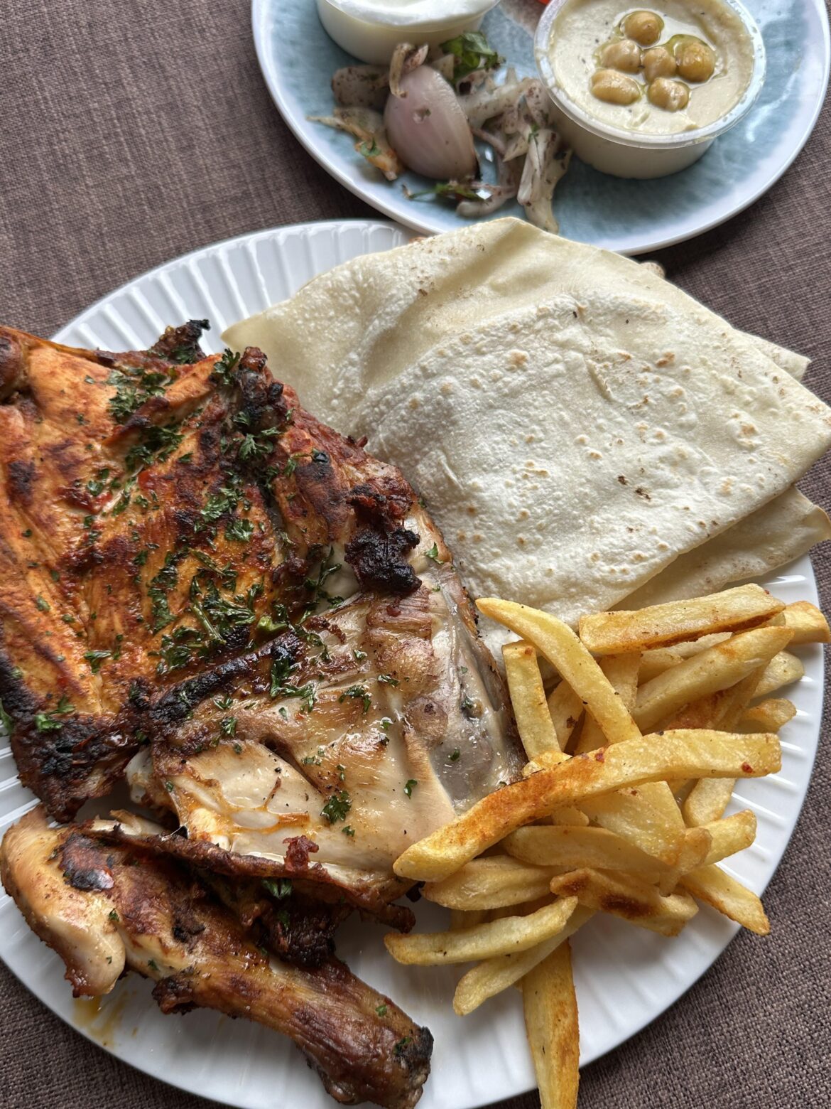 Grilled chicken with hummus and bread