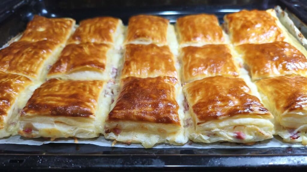 Puff pastry with cheese, ham and bacon