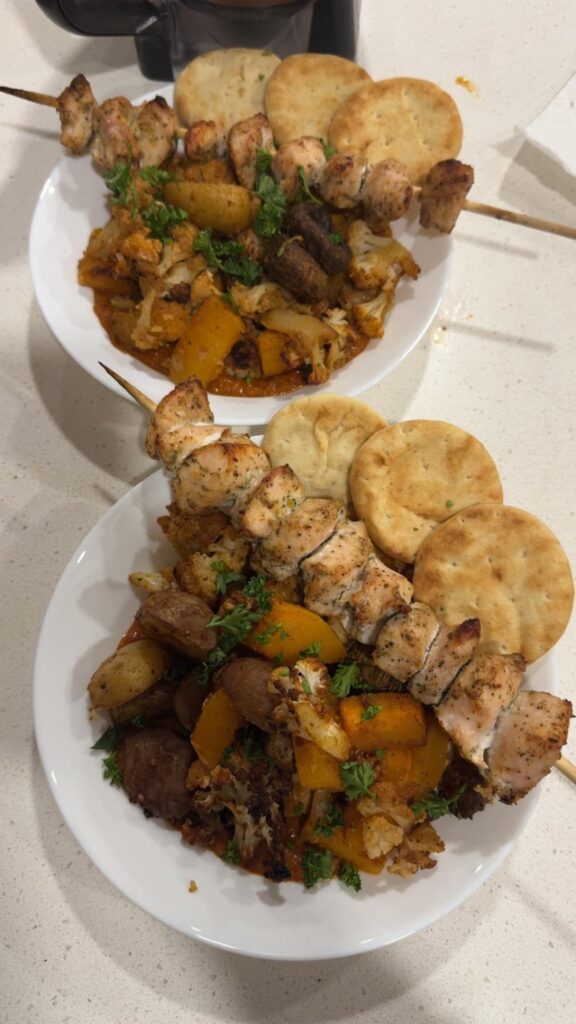 Roasted Veggie Bowl with Pepper dip, chicken, and naan bread