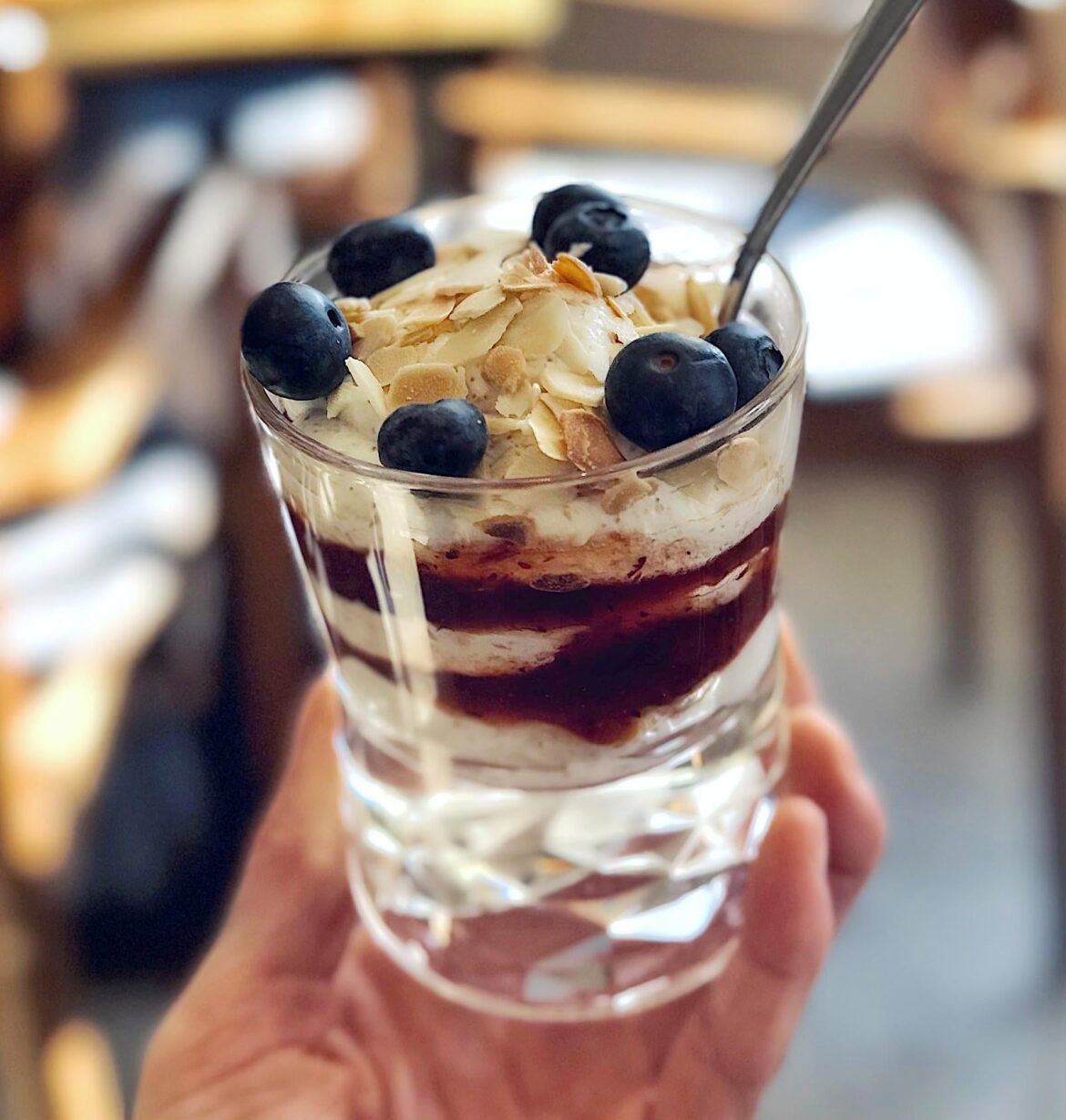 Kama mousse with strawberry jam, blueberries and almond flakes