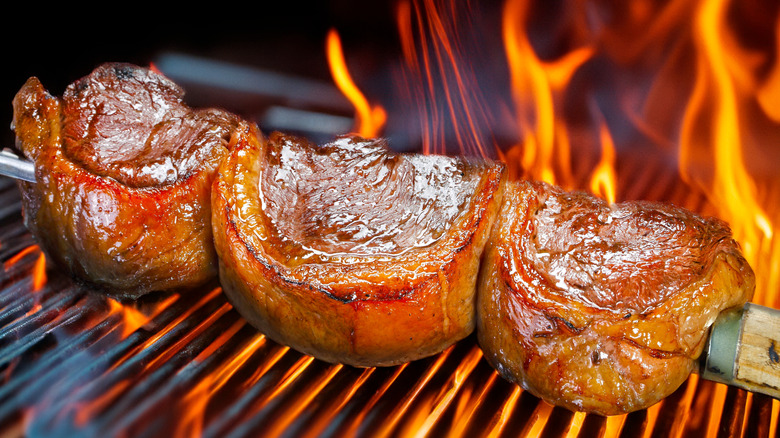 Pichana being grilled over open fire