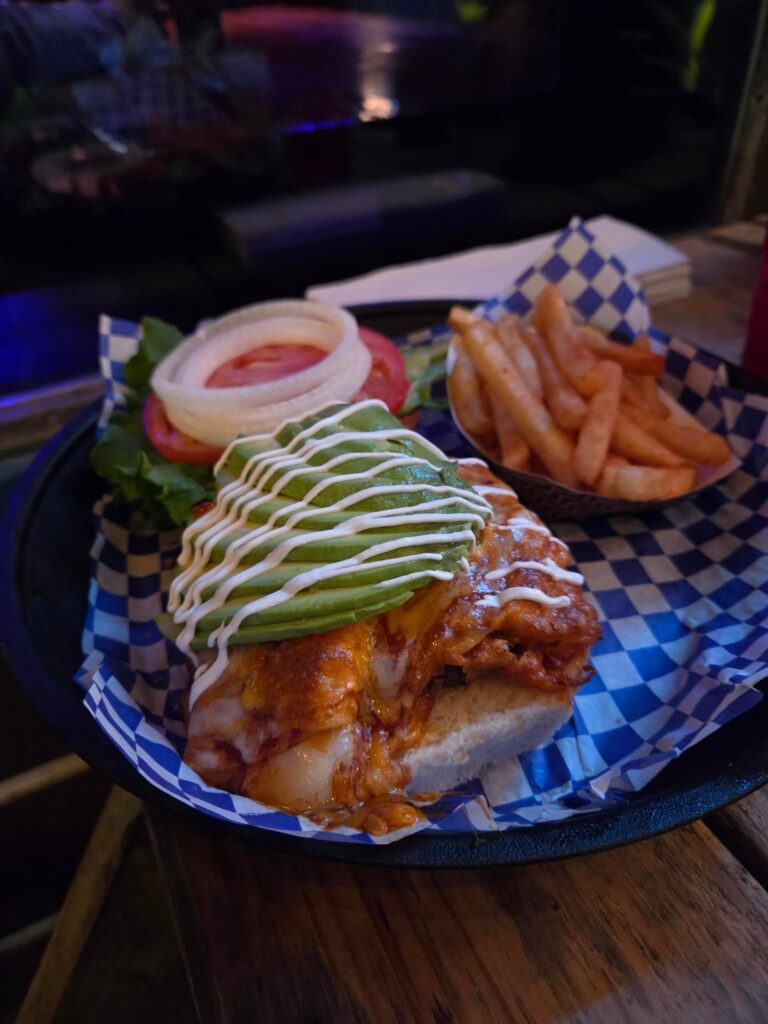 These absolute mad lads put cheese enchiladas on a cheeseburger.