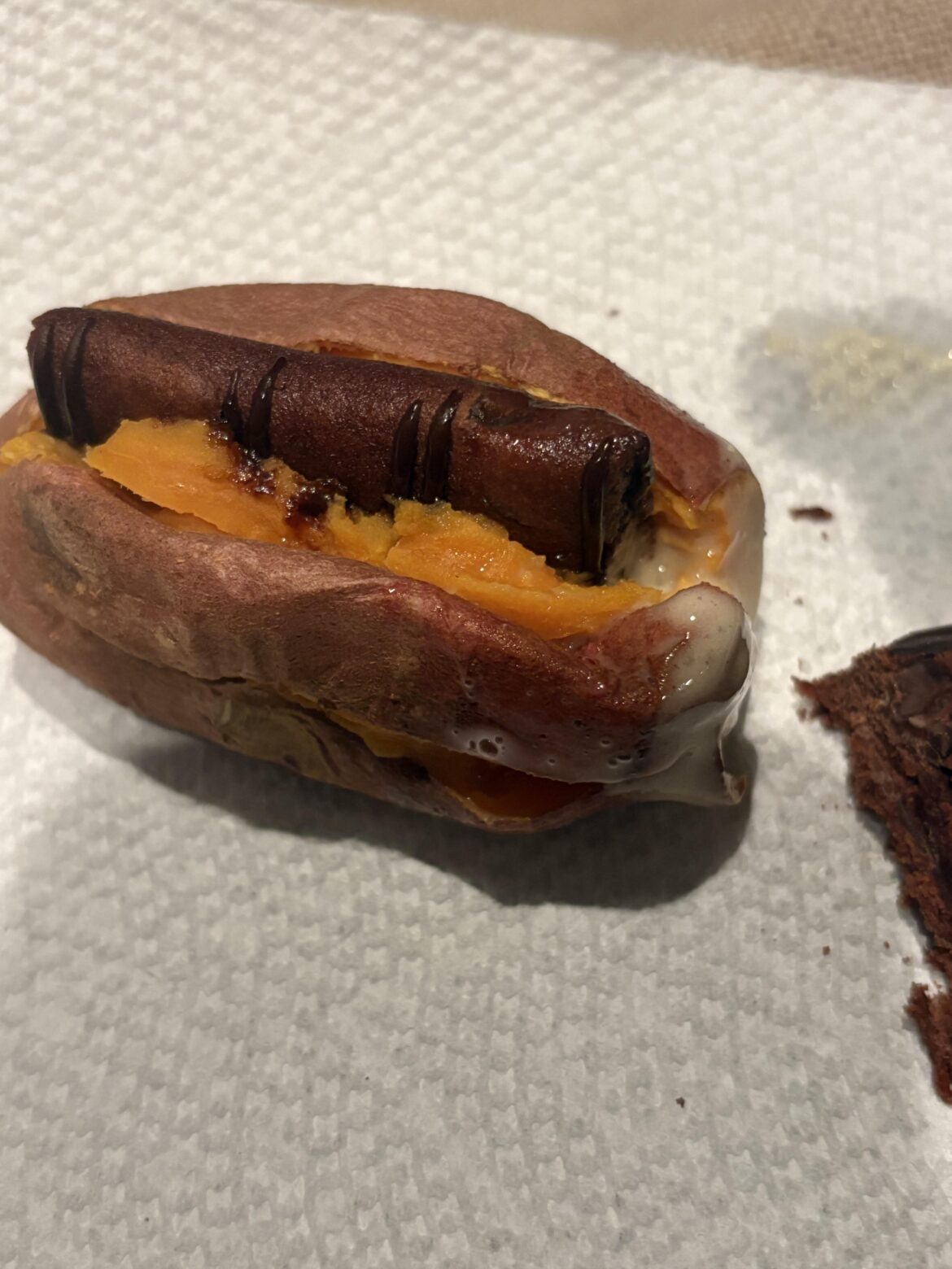 Fiber brownie stuffed in a sweet potato dipped in mystery sauce