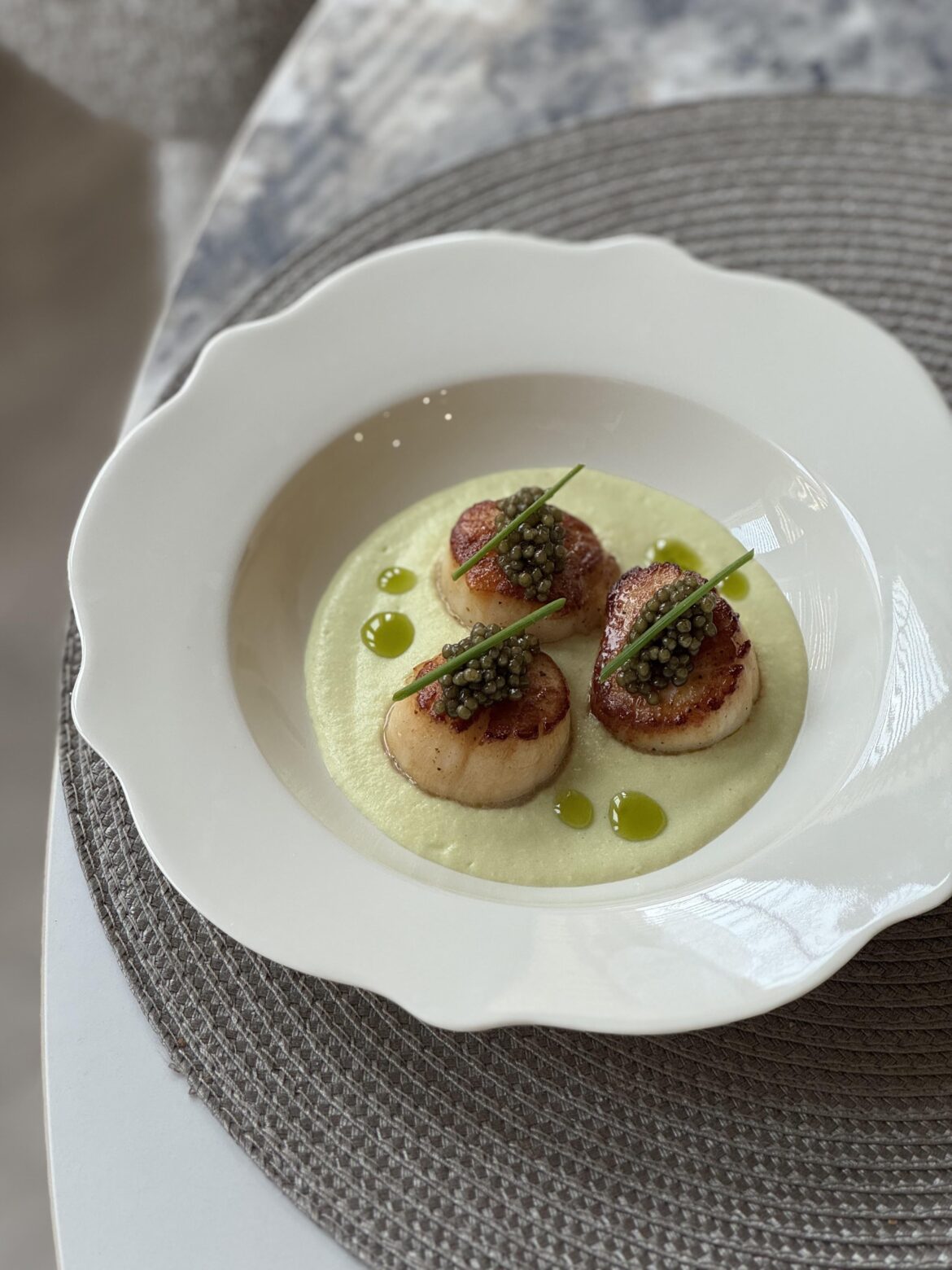 Leek and potato puree, Pan-seared Scallops, Royal Ossetra caviar, Chives, Roasted Nori oil Leek and potato puree, Pan-seared Scallops, Royal Ossetra caviar, Chives, Roasted Nori oil