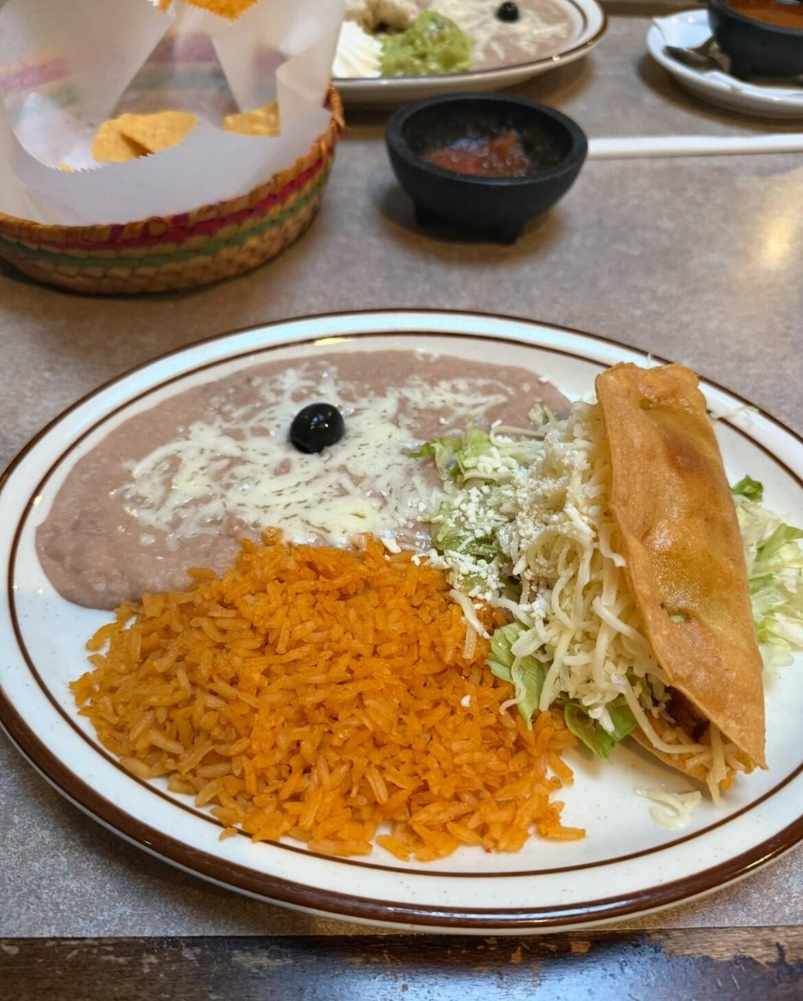 Something about that single black olive