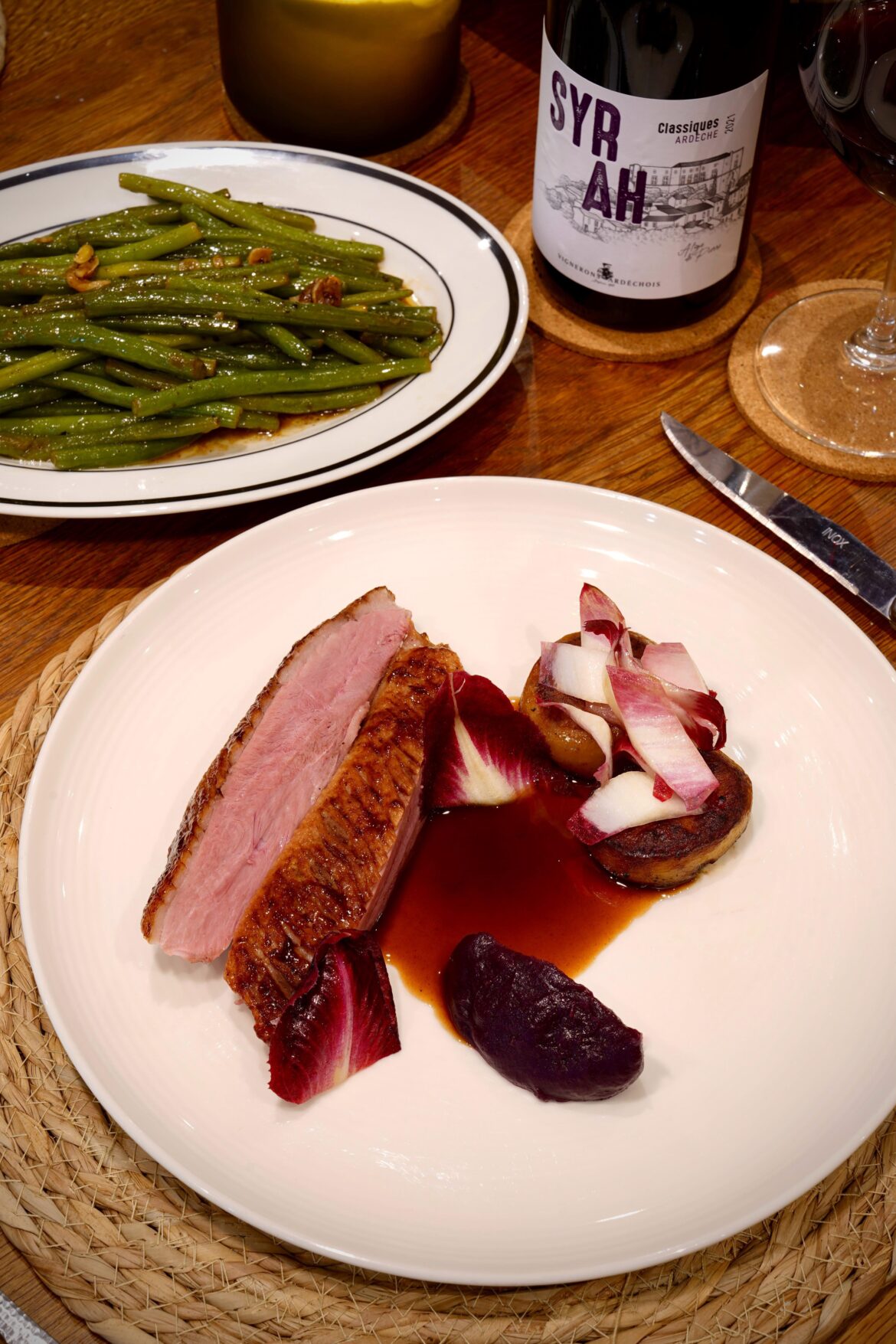 Cherry Hoisin Roasted Duck Crown, Fondant Potato, Braised Cabbage Purée, and Beans Cherry Hoisin Roasted Duck Crown, Fondant Potato, Braised Cabbage Purée, and Beans