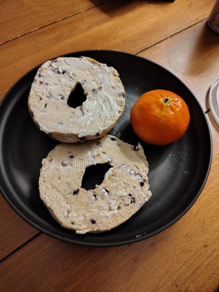 Bagel, Clementine and a yogurt bowl