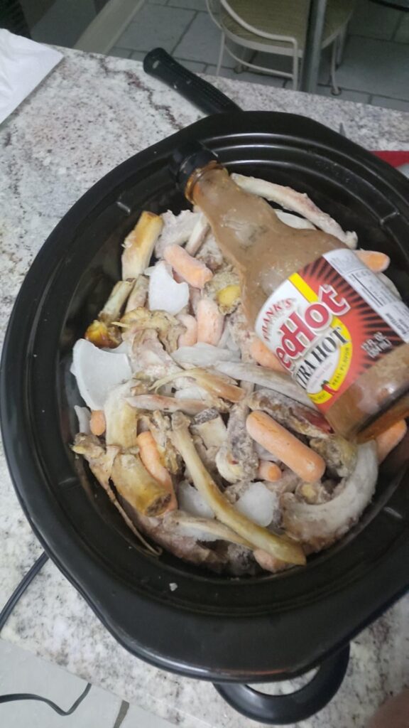 Save the empty hot sauce bottles for making stock. Add water, shake the bottle, and pour over bones. Repeat until bottle is clean.