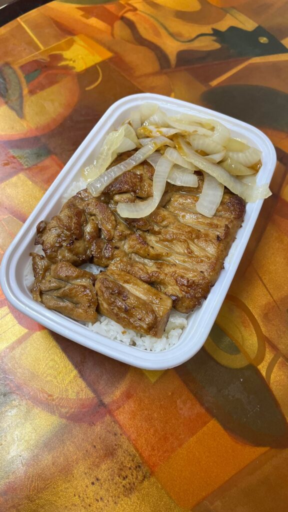 S Wan Cafe’s Pork Chop with Onions Over Rice for $9.50. Most items on their menu are around $10 or less. (Chinatown, Manhattan)