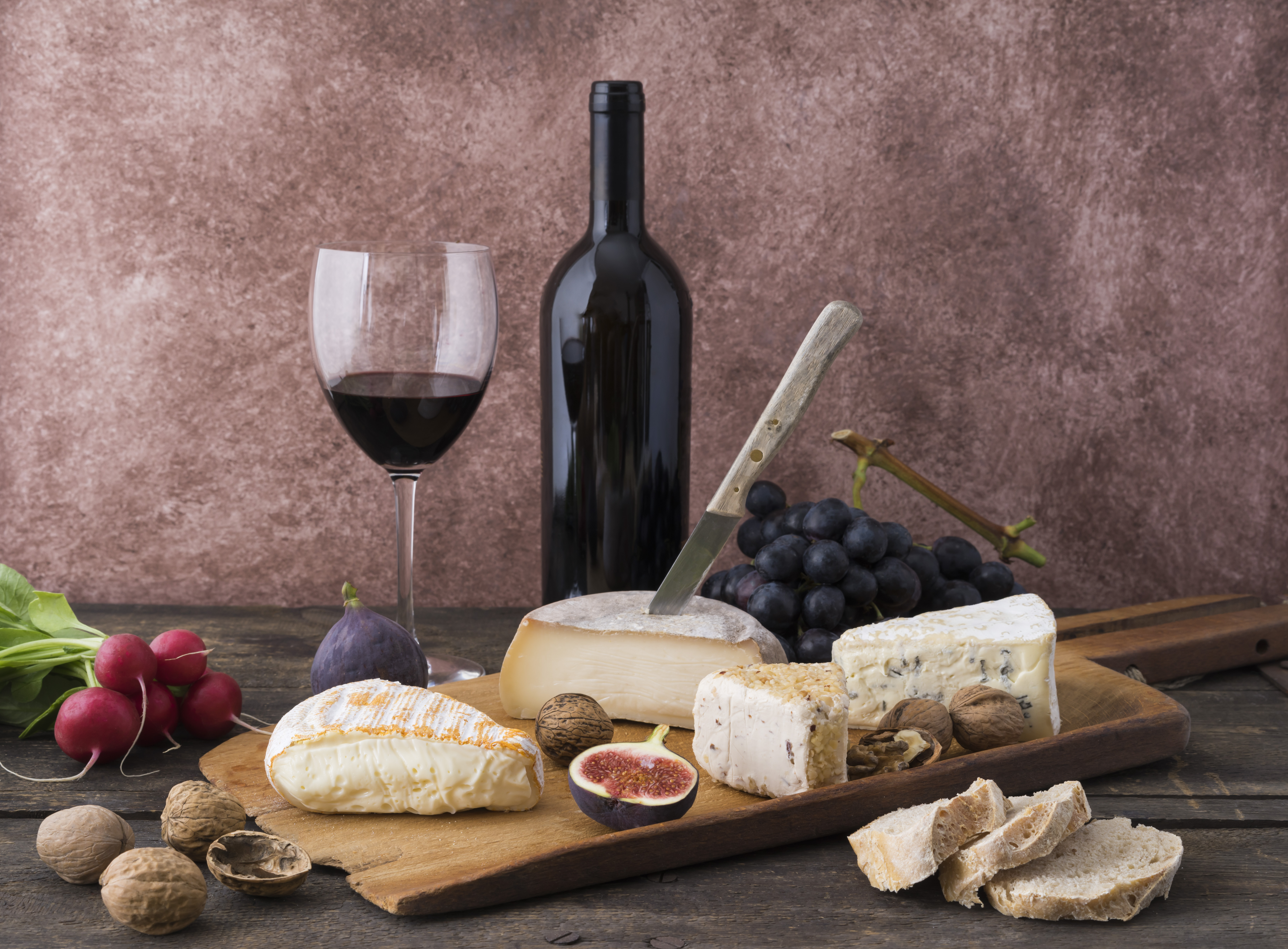 Cheese platter with red wine.