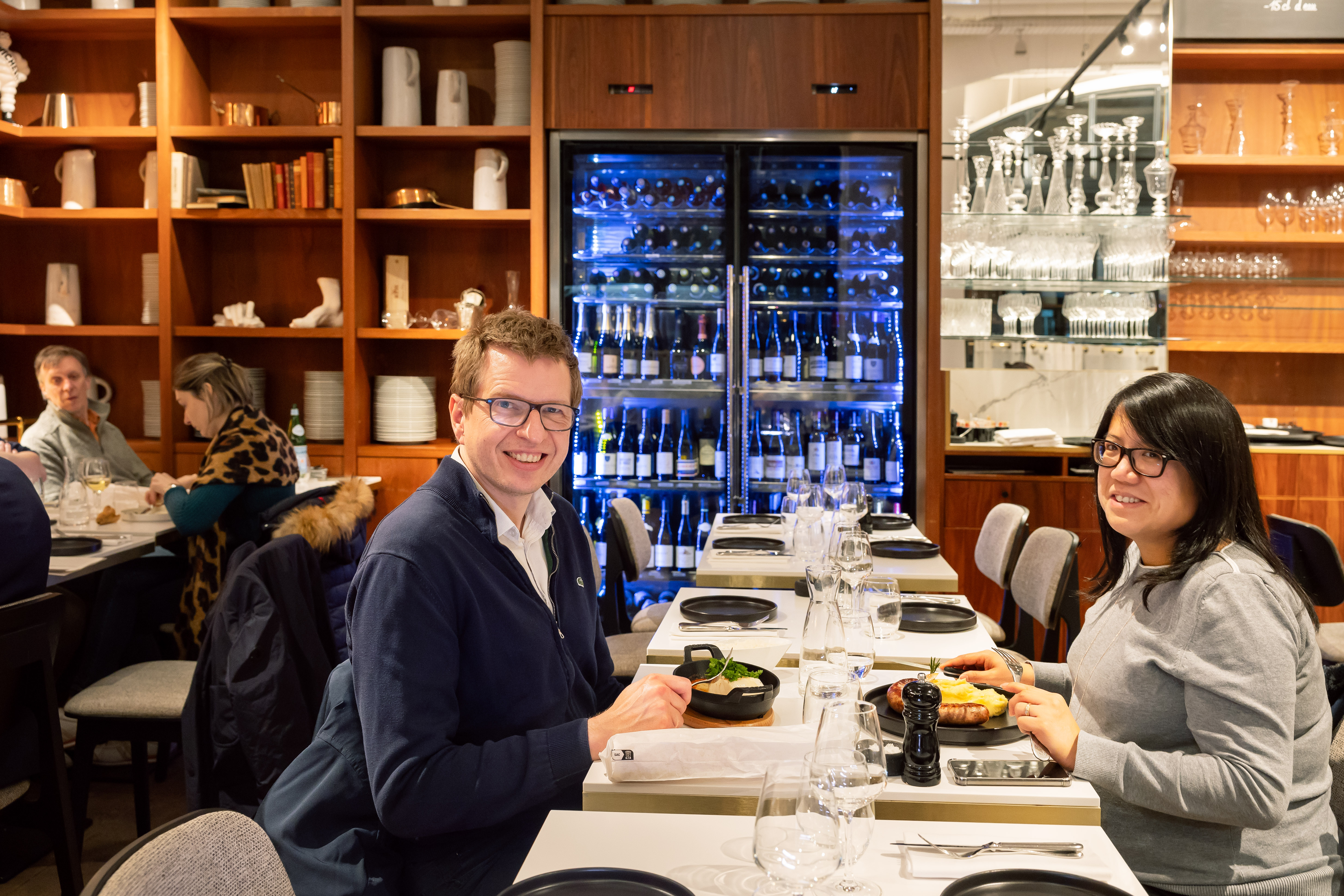 Cécile and Benjamin COLLET having an early dinner at Restaurant Lazar in Paris.