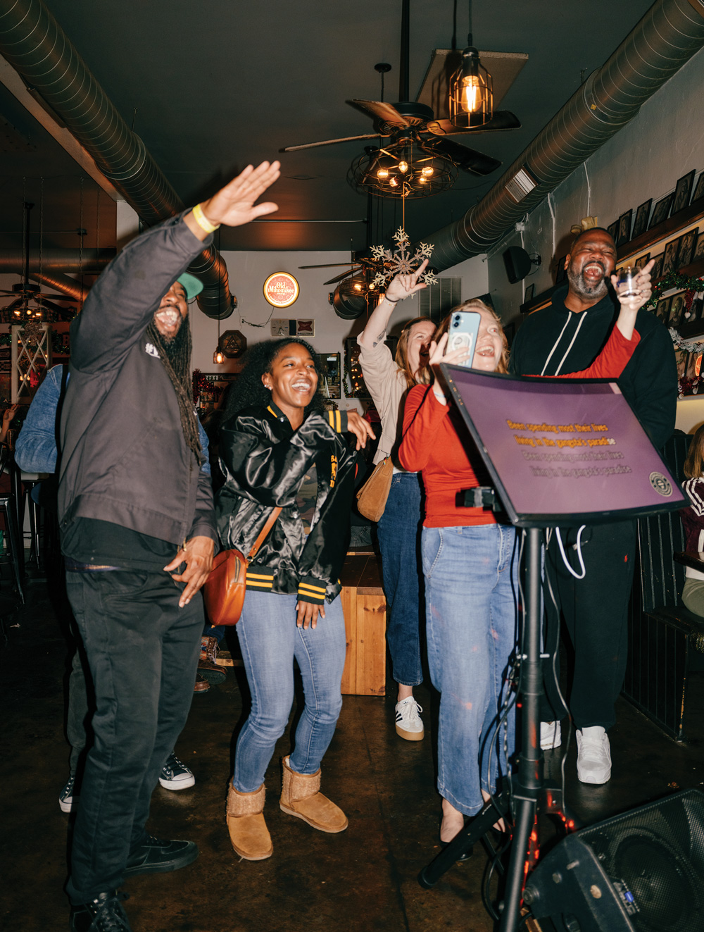 people singing and enjoying themselves at Karaoke at Bob & Harriet’s Home Bar
