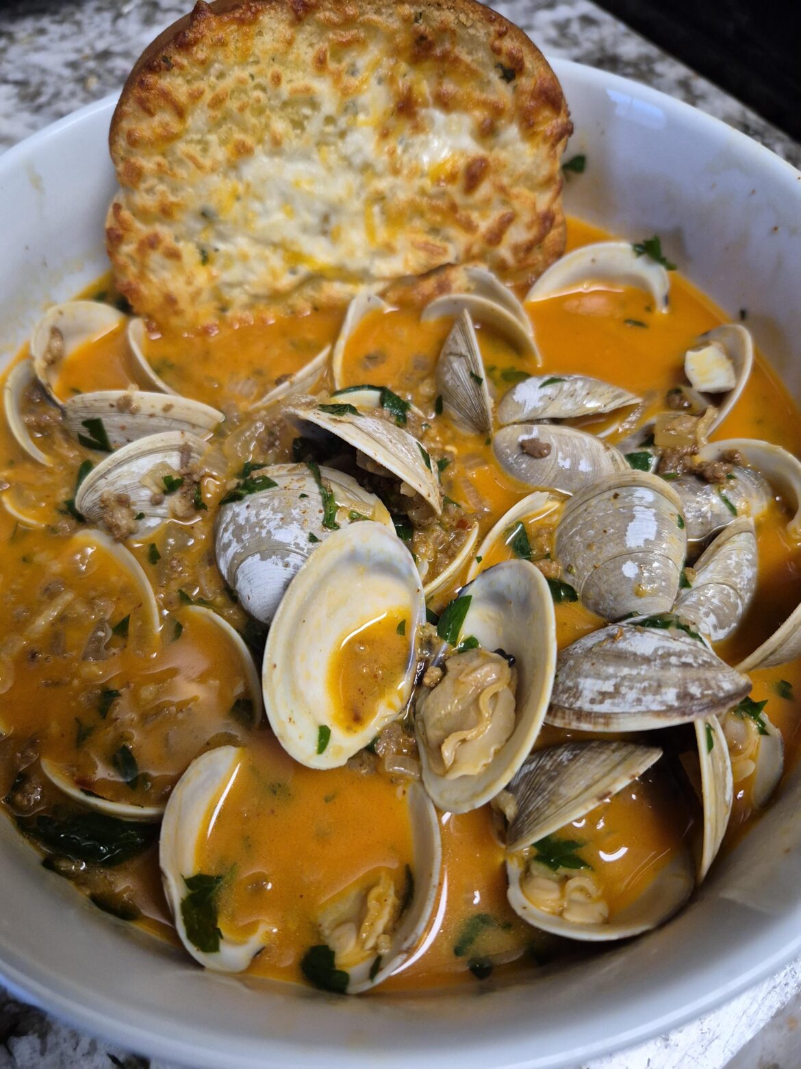 Clams with chorizo in wine sauce