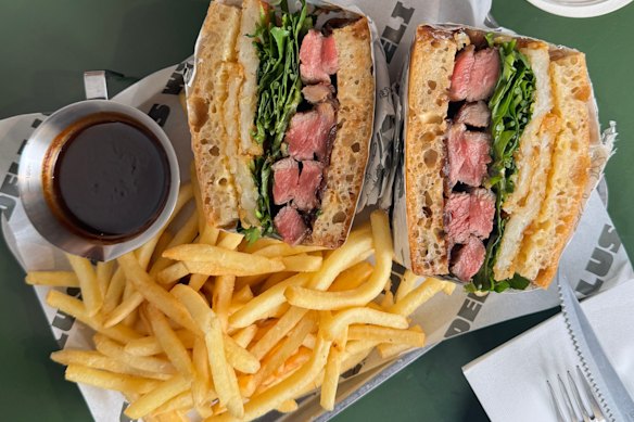 The jus on the side gives the Lu's Deli sandwich big Sunday roast vibes.