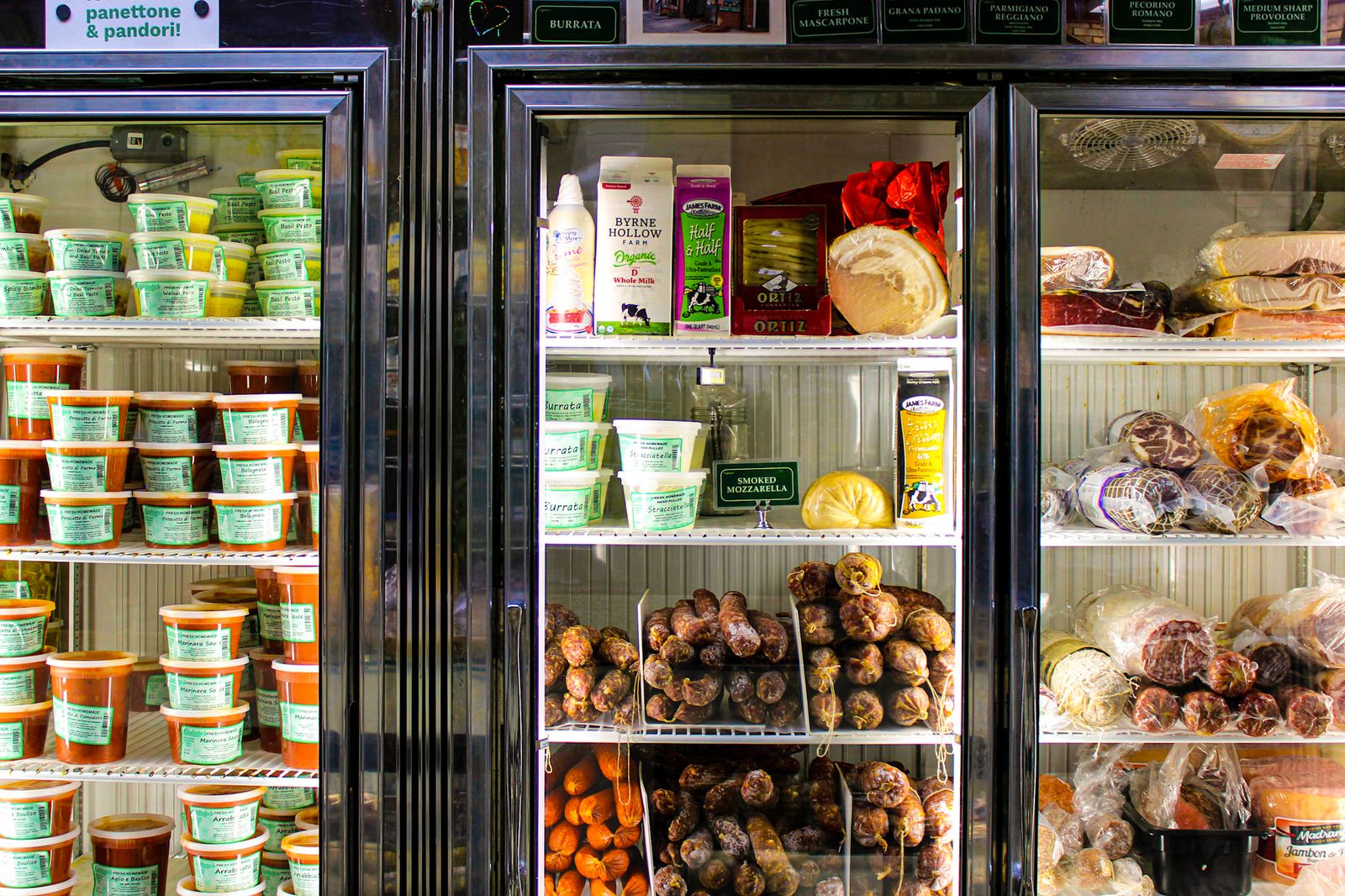 Stocked fridges inside Caputo's Fine Foods