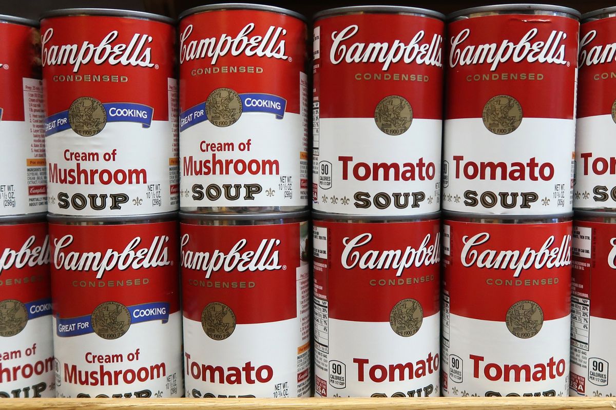 Cans of Campbell's soup sit on a shelf in a grocery store on September 28, 2018 in Hoboken, New Jersey