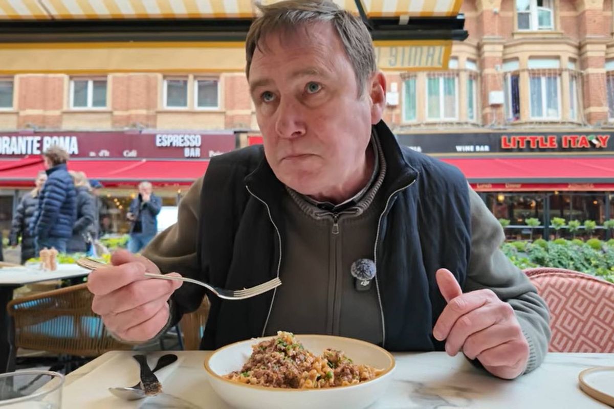 Gary eating a bolognese