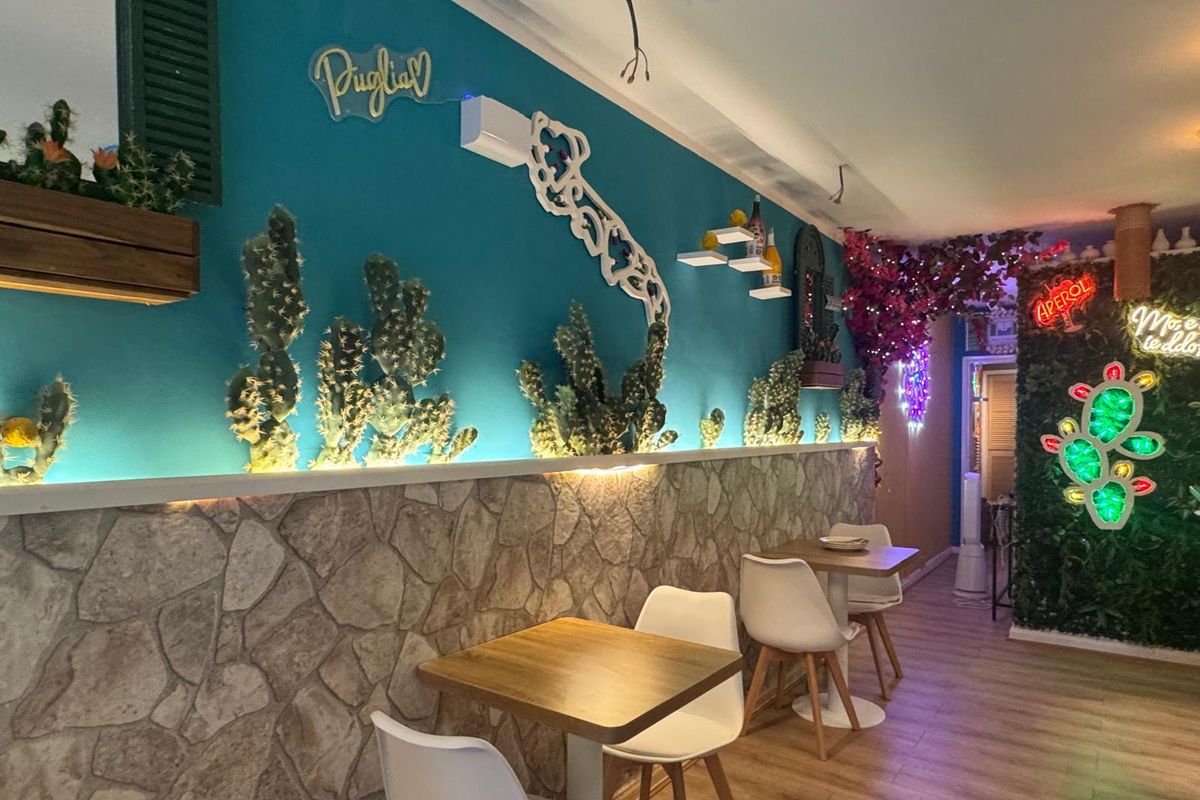 Tables and chairs inside New Italian cafe and bistro Mo' Mo' in Long Eaton