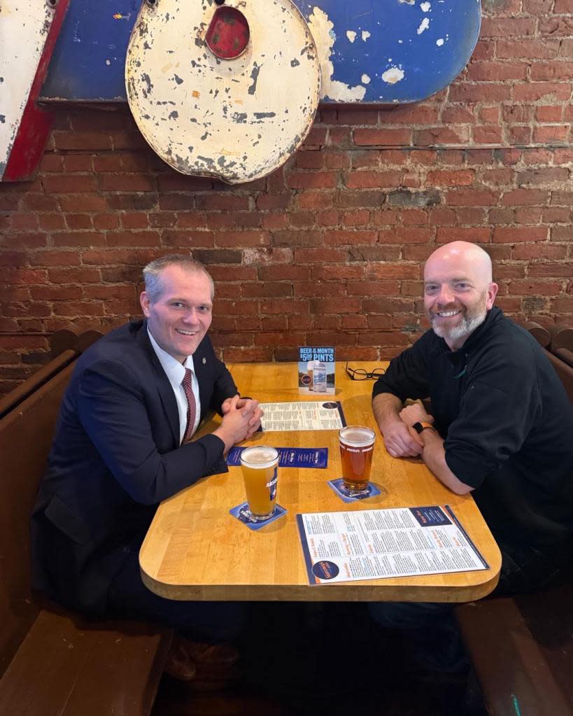 Minnesota representatives, Republican Bjorn Olson and Democrat Brad Tabke, showed up to Sweeney’s Saloon for the “Dine Across the Aisle” deal. Instagram/@sweeneyssaloon