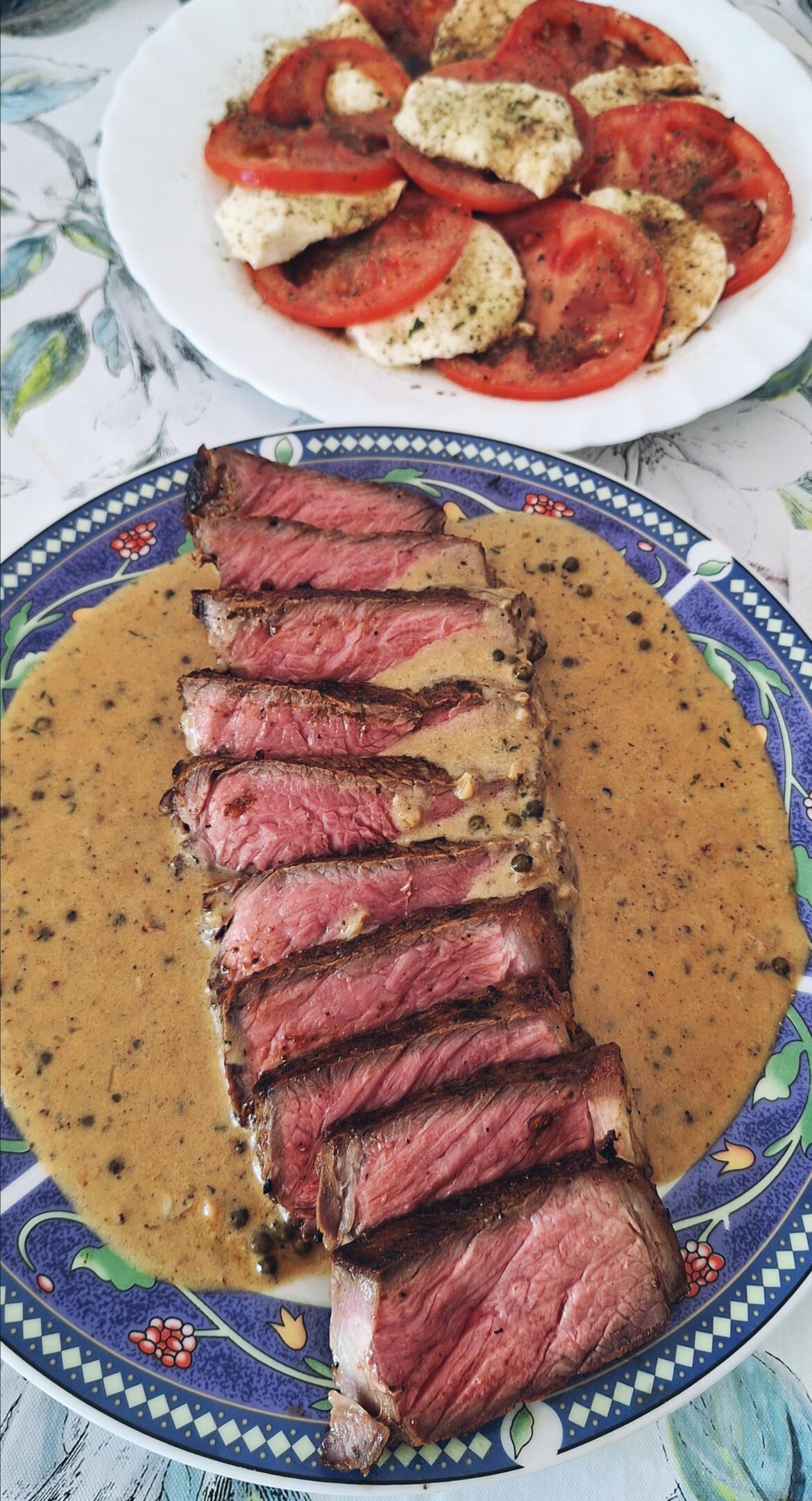 Peppercorn sauce steak