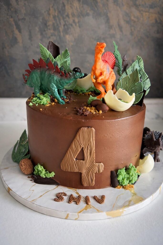 Dino cake for a 4 yo - all edible except the dinos