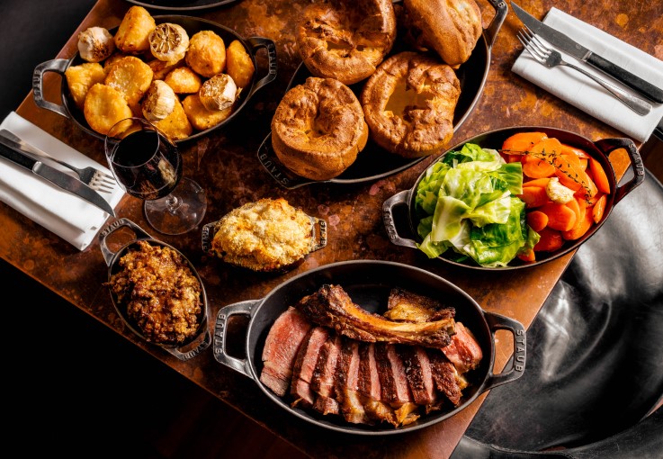A traditional Sunday roast with plenty of side dishes at Hawksmoor. © Cal Holland