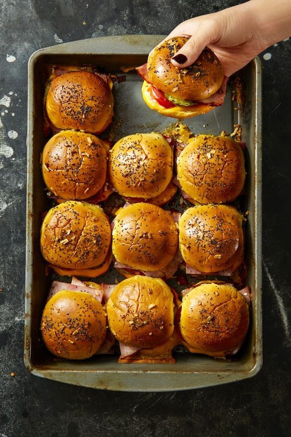 ham and cheese sliders on a baking sheet