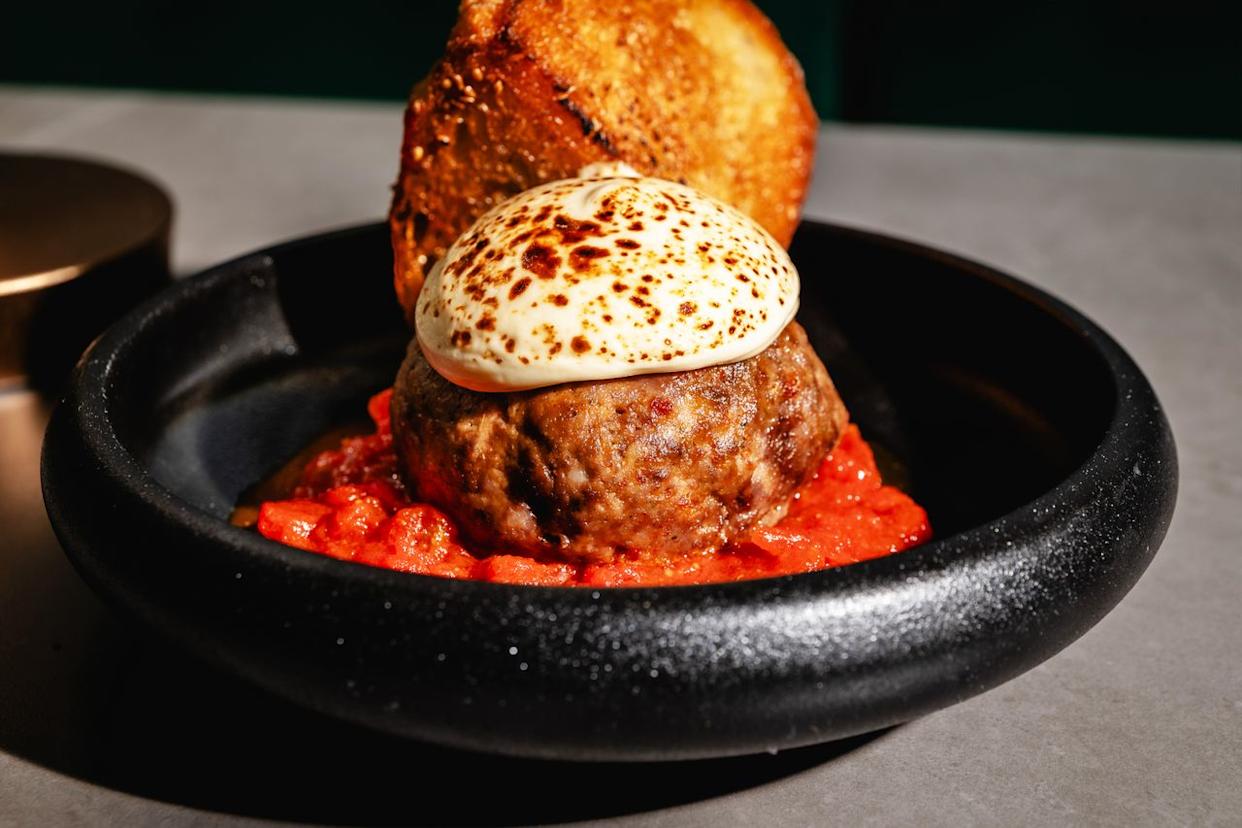The popular caramelized meatball at OISE in Fort Myers, Florida.Credit: Photo By German Garcia / Bradley Kilgore