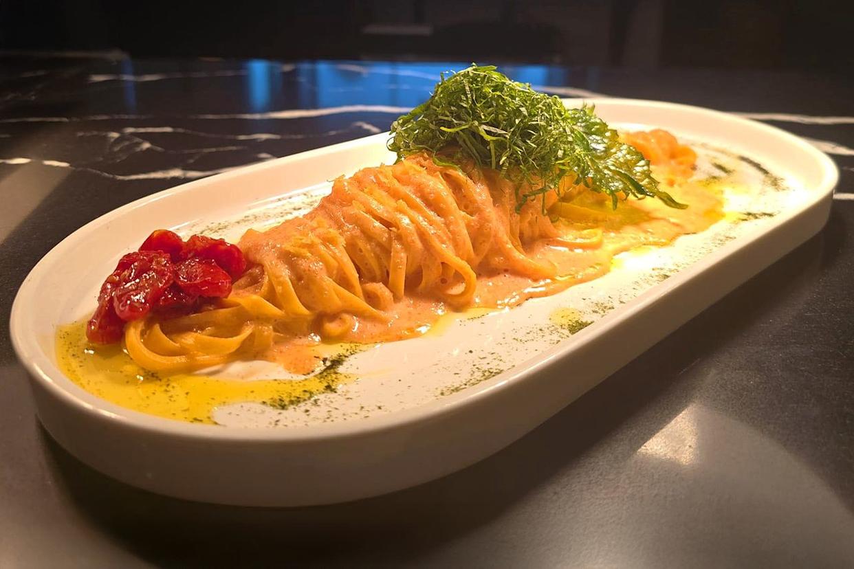 The mentaiko pasta, made with tonnarelli noodles, shiso, and sun-dried tomato, at Junah.Credit: Courtesy of Junah