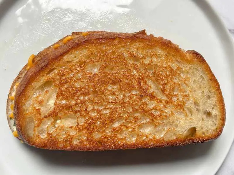 Grilled cheese on plate.