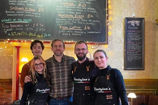 Charlie with staff at Portofino's