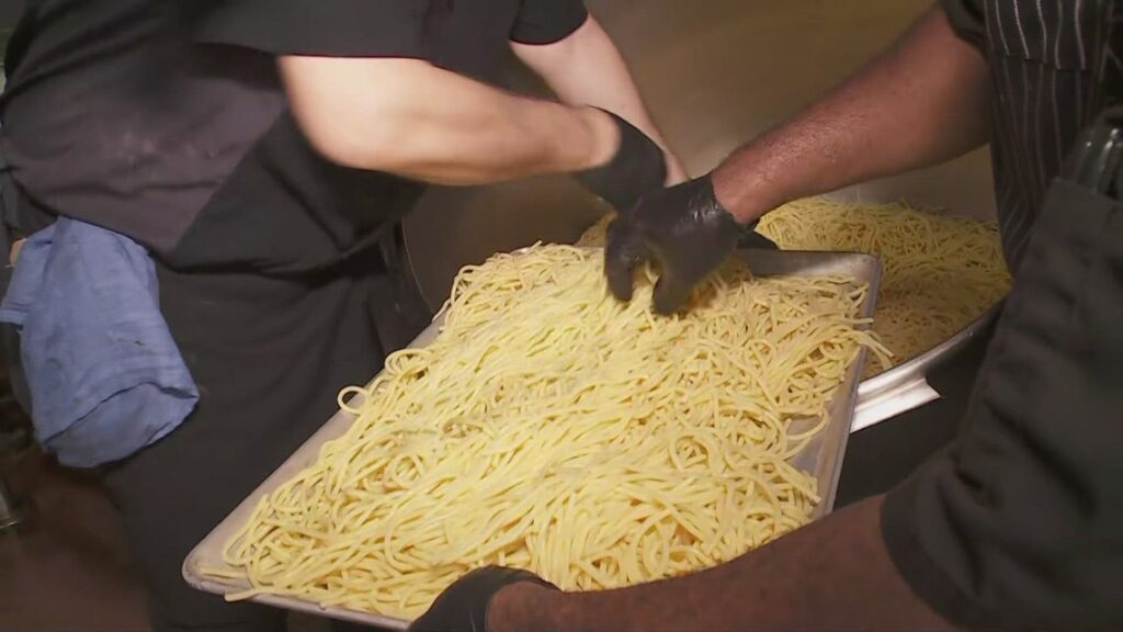 Italian American St. Joseph Society cooking up the world’s largest bowl of pasta Italian American St. Joseph Society cooking up the world’s largest bowl of pasta