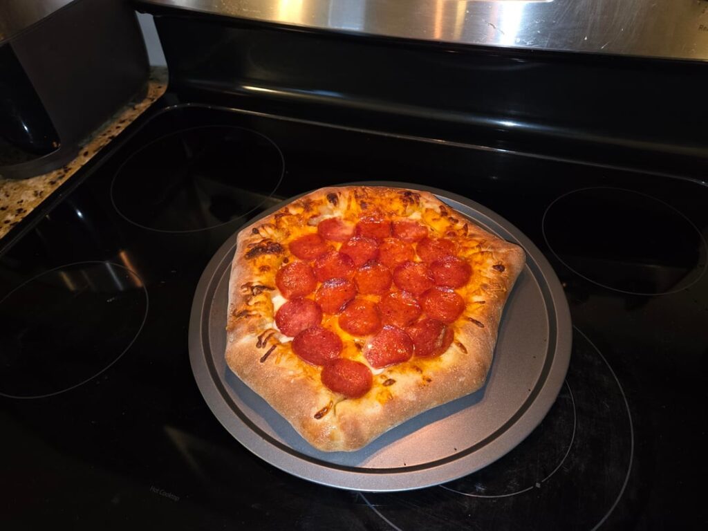 Tried making homemade stuffed crust pizza for the first time. Turned out quite well!