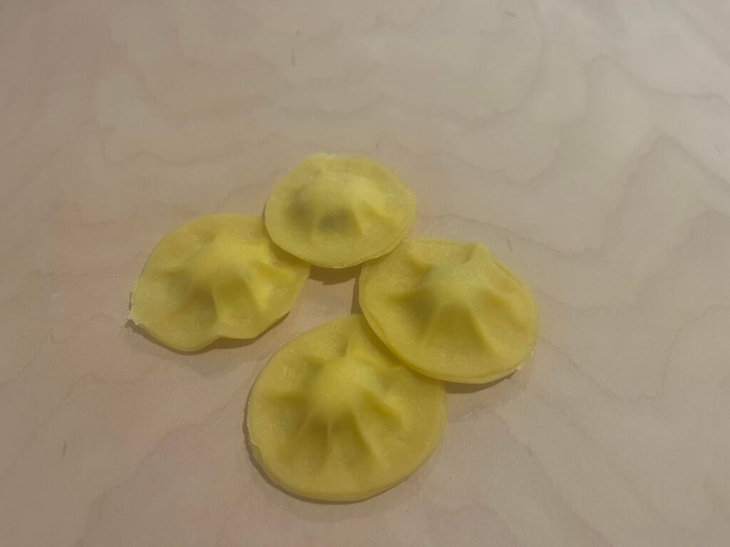 Caramelized pears,ricotta and parmigiano ravioli with a butter sauce